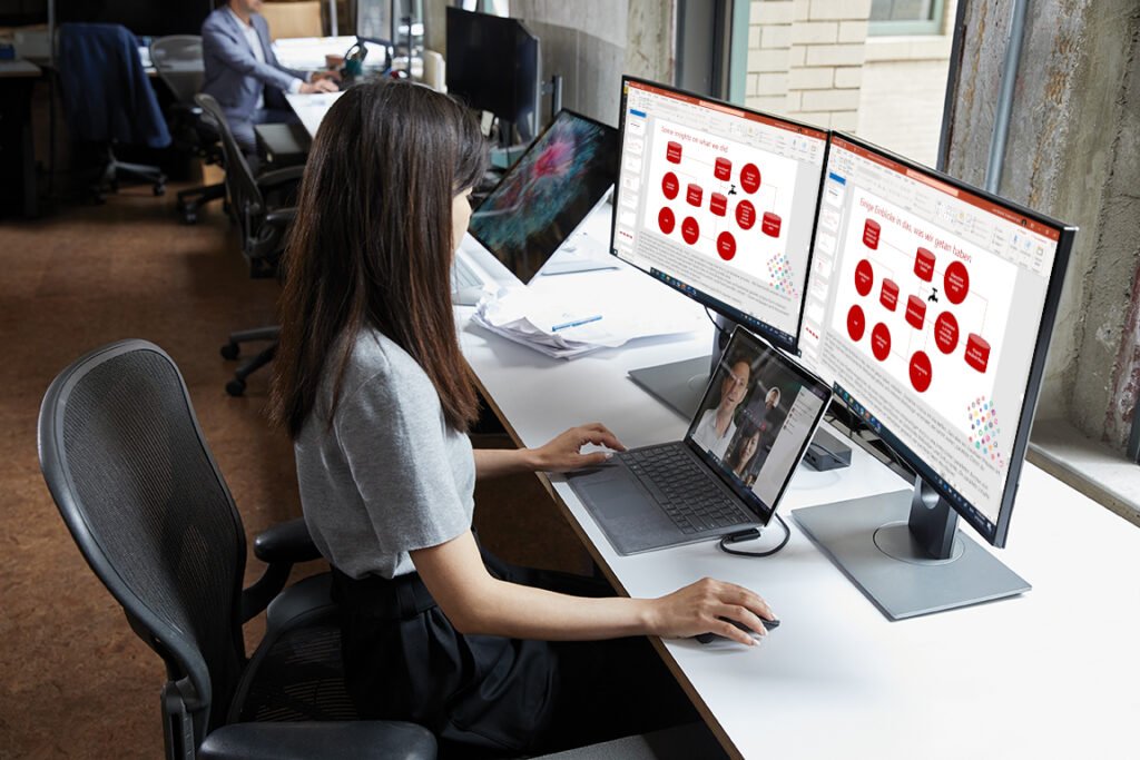 A translator working on a bilingual document on their computer - A social media dashboard showing analytics and content planning