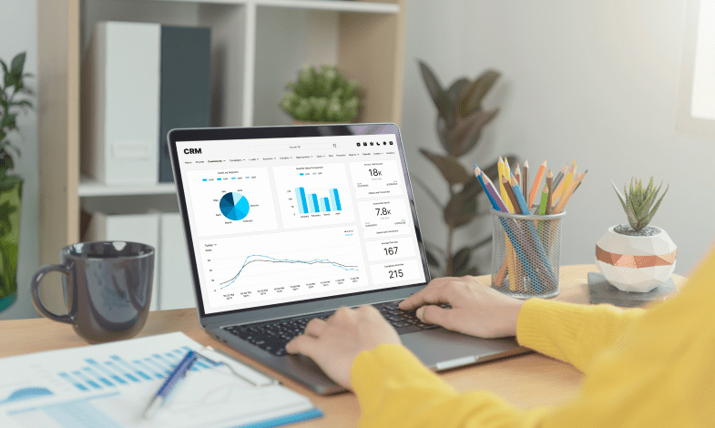 A modern team collaborating over a digital dashboard or CRM interface -  crm management software