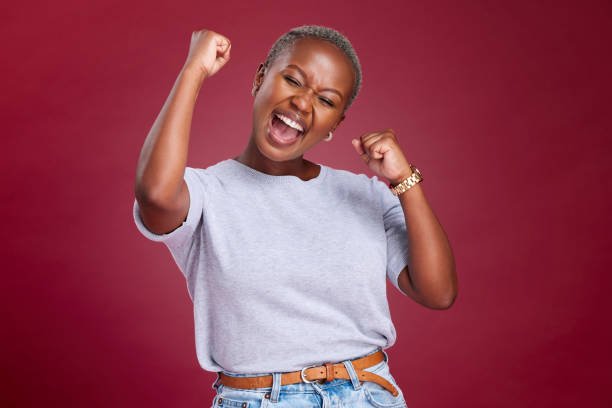 A motivational image showing a person celebrating success - remote customer service jobs with no experience